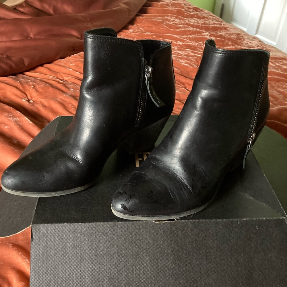Frye black leather booties.  Zipper sides and 2” heel.